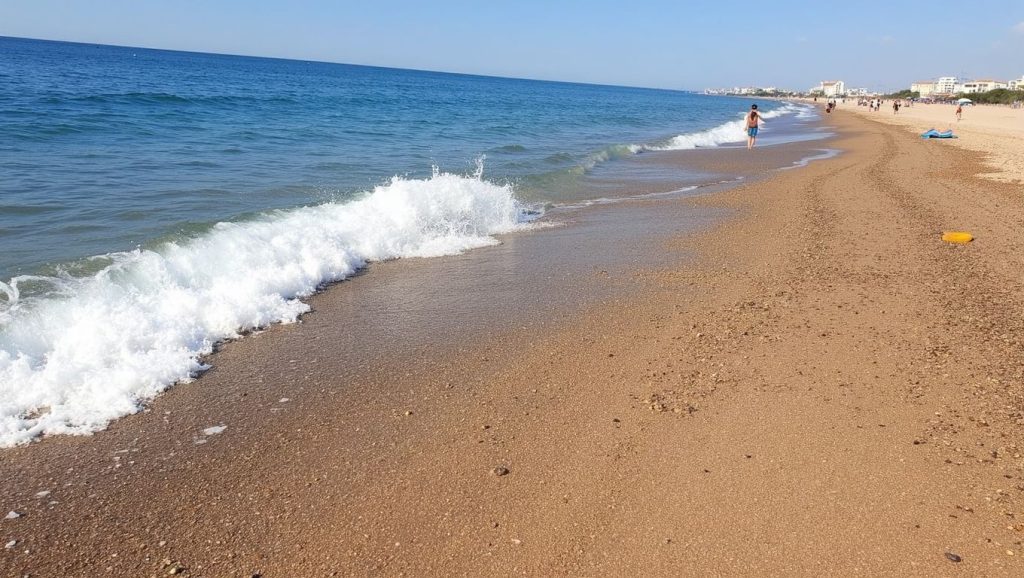 Agua y arena en Platja de Malgrat Sud, Malgrat de Mar