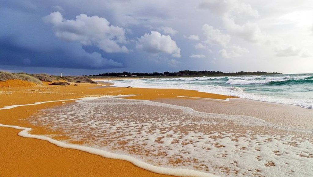 Detalle de arena y agua en Praia da Sebeira, Galicia