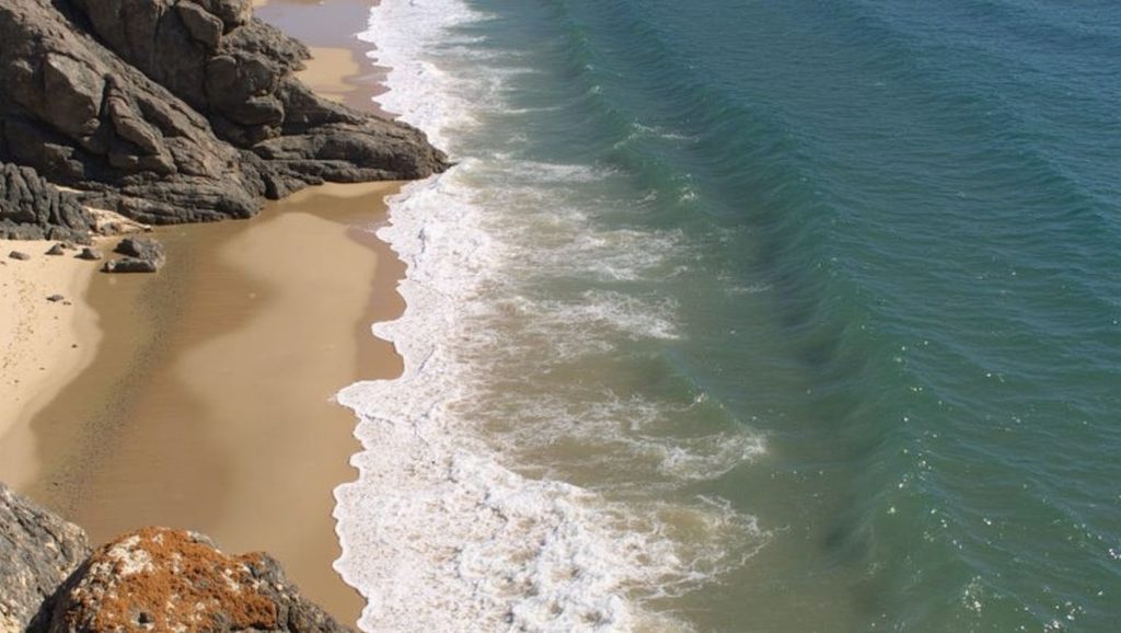 Arena y mar en Praia de Queiruga, Galicia, A Coruña