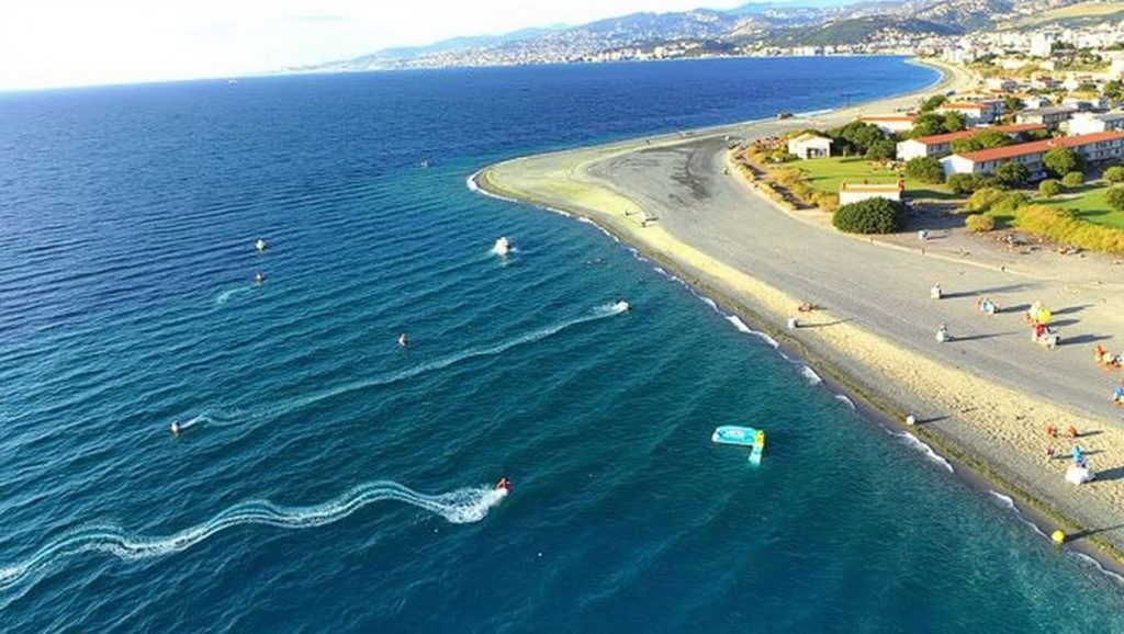 Detalle de arena y agua en Playa de Messina 31, Messina
