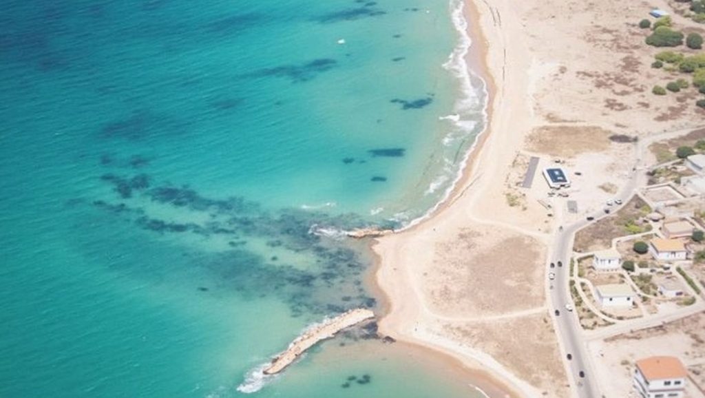 Agua y arena en Playa de Realmonte 5, Realmonte