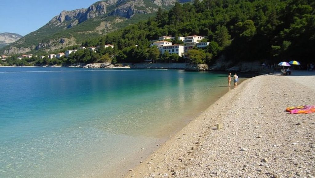 Detalle de arena y agua en Magazin, Croacia