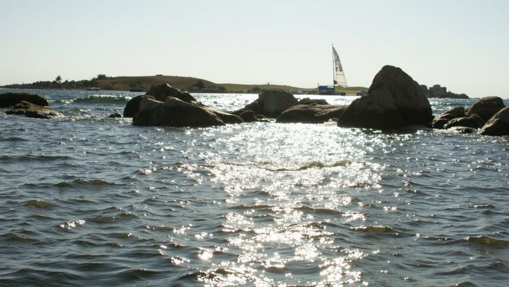 Arena y mar en Plage de Davia, Calvi, Córcega