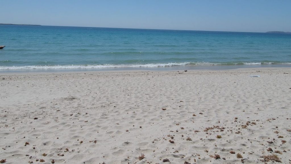 Arena fina en Plage de Pisonaccio, Cap Corse, Córcega