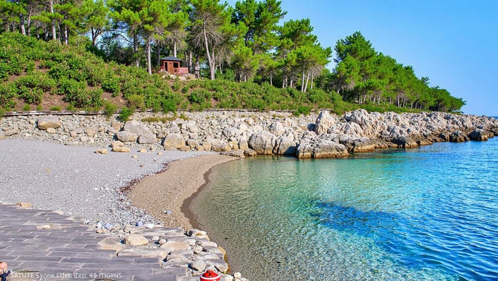 Agua y arena en Plaža Plavina, Grad Korčula