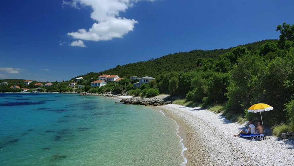 Agua y arena en Tri žala, Grad Korčula