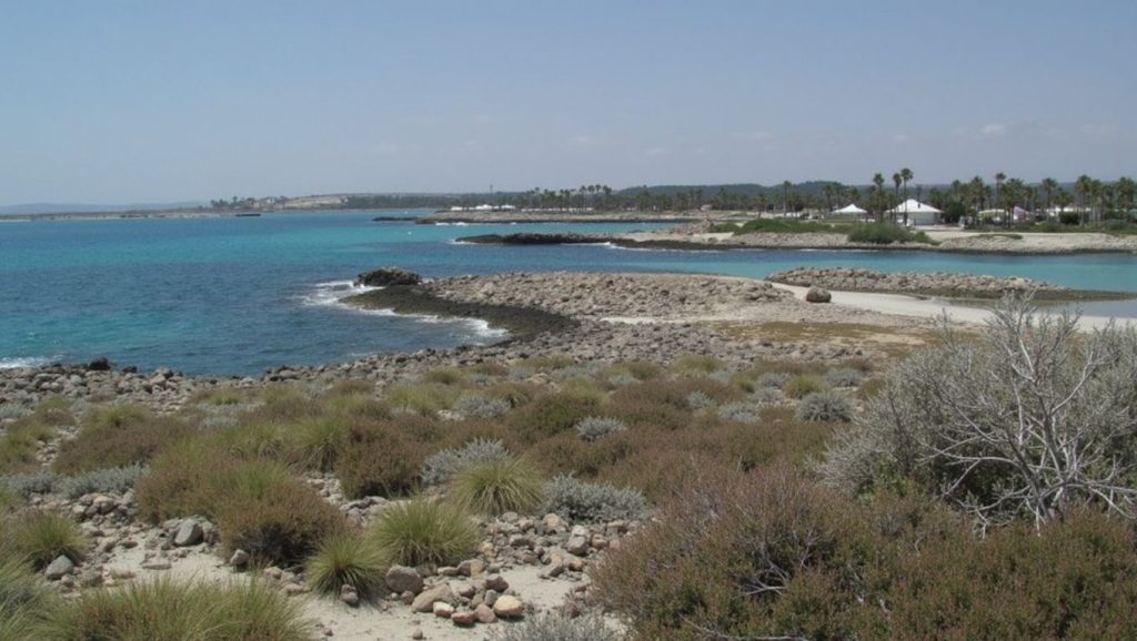 Agua y arena en Vouppa Beach, ?