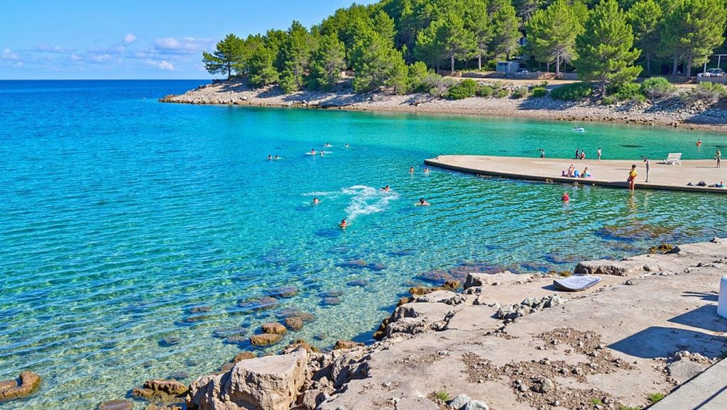 Detalle de arena y agua en Zenčišće, Općina Jelsa