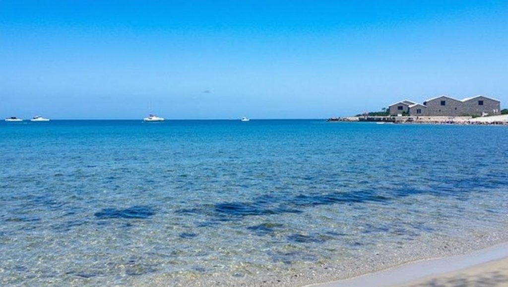 Detalle de arena y agua en Spiaggia di Morghella, Portopalo di Capo Passero